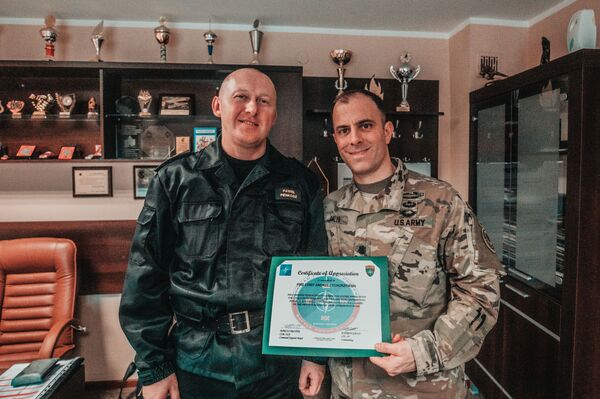 Photo: NATO Awards Polish Firefighters for Extinguishing US Armored Carrier’s Engine Fire - Sputnik International