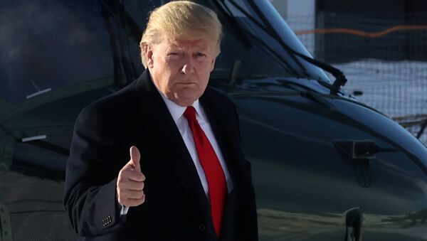 U.S. President Donald Trump gestures as he walks out of the Marine One helicopter - Sputnik International