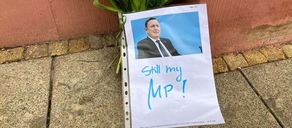 Flowers and a picture with the words still my MP! of former State Premier of Thuringia sit outside the state chancellery in Erfurt, Germany, 6 February 2020. - Sputnik International