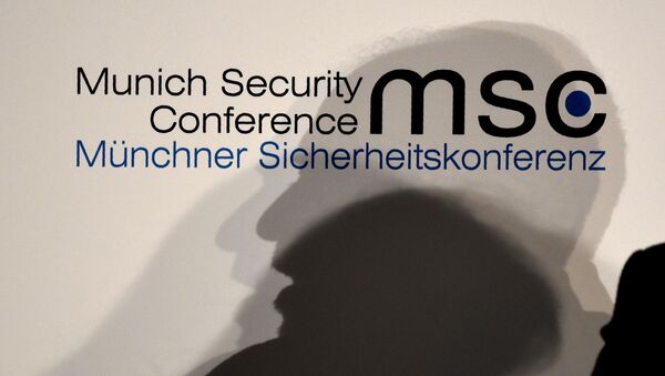 The shadow of Iranian Foreign Minister Mohammad Javad Zarif is seen as he speaks on the second day of the Munich Security Conference - Sputnik International
