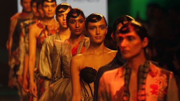 Models walk the ramp to showcase the creations of House of Three X Tantajo during Lakme fashion week in Mumbai, India, Thursday, Feb. 13, 2020. - Sputnik International