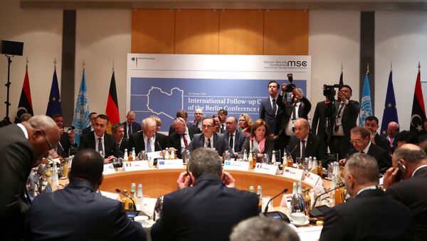 Members of the international committee take their seats for a follow-up meeting on Libya, arranged by German Foreign Minister Heiko Maas, in Munich, Germany February 16, 2020 - Sputnik International