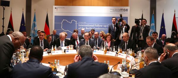 Members of the international committee take their seats for a follow-up meeting on Libya, arranged by German Foreign Minister Heiko Maas, in Munich, Germany February 16, 2020 Members of the international committee take their seats for a follow-up meeting on Libya, arranged by German Foreign Minister Heiko Maas, in Munich, Germany February 16, 2020 - Sputnik International