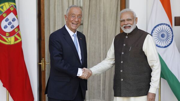 Portugal's President Marcelo Rebelo de Sousa and India's Prime Minister Narendra Modi shake their hands ahead of their meeting at Hyderabad House in New Delhi, India, February 14, 2020 - Sputnik International