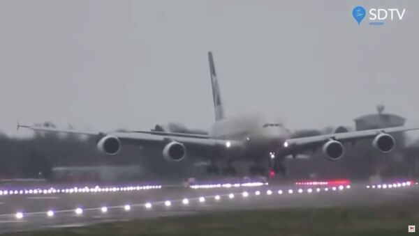 Etihad Airways Airbus A380 is pictured during severe crosswind landing at London’s Heathrow Airport, London, Britain, February 15, 2020 in this screen grab obtained by Reuters from social media video on February 16, 2020 - Sputnik International