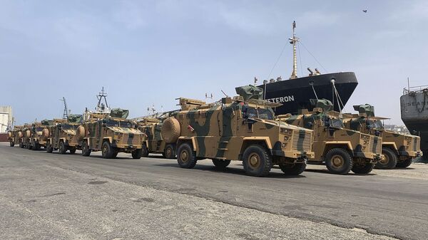 A photo posted on the Facebook Page of the media bureau of the Volcano of Anger operation on 18 May 2019, reportedly shows Turkish-made armoured personnel vehicles, shipped to Libya's internationally recognised Government of National Accord (GNA), arriving at Tripoli port - Sputnik International