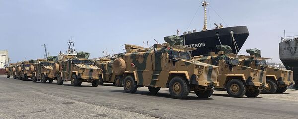 A photo posted on the Facebook Page of the media bureau of the Volcano of Anger operation on 18 May 2019, reportedly shows Turkish-made armoured personnel vehicles, shipped to Libya's internationally recognised Government of National Accord (GNA), arriving at Tripoli port - Sputnik International