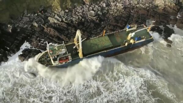 Undated image released Monday Feb. 17, 2020, by Irish Coast Guard showing an abandoned cargo ship the MV Alta, that has washed up on the coast of County Cork, near Ballycotton, southern Ireland.  The MV Alta is believed to have had 10 crew members aboard who were rescued by the US Coast Guard.  Since September 2018, the ship has been drifting with no crew aboard, and it was last seen off the coast of West Africa before being washed up in southern Ireland during Storm Dennis. - Sputnik International
