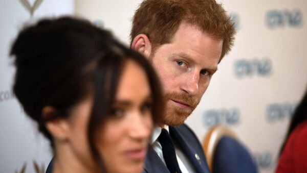 Britain's Prince Harry and Meghan Duchess of Sussex attend a roundtable discussion on gender equality at Windsor Castle in Windsor - Sputnik International