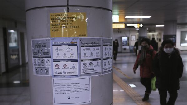 Notices about precautions against the illness COVID-19 at a subway station in Seoul - Sputnik International