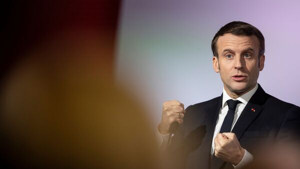 French President Emmanuel Macron gestures as he delivers a speech during a press conference - Sputnik International