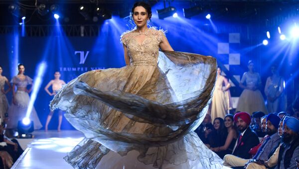 In this photo taken on November 19, 2019, Bollywood actress Karisma Kapoor walks on a ramp during a fashion show at a hotel on the outskirts of Amritsar - Sputnik International