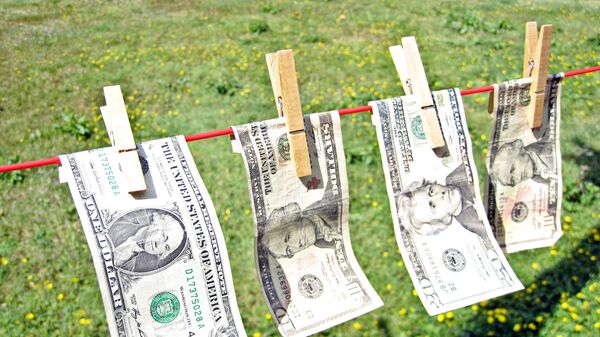 Laundering dollar bills - Sputnik International