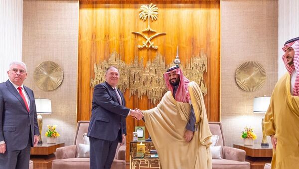 Saudi Arabia's Crown Prince Mohammed bin Salman shakes hands with US Secretary of State Mike Pompeo in Riyadh, Saudi Arabia 20 February 2020. Bandar Algaloud/Courtesy of Saudi Royal Court/ - Sputnik International
