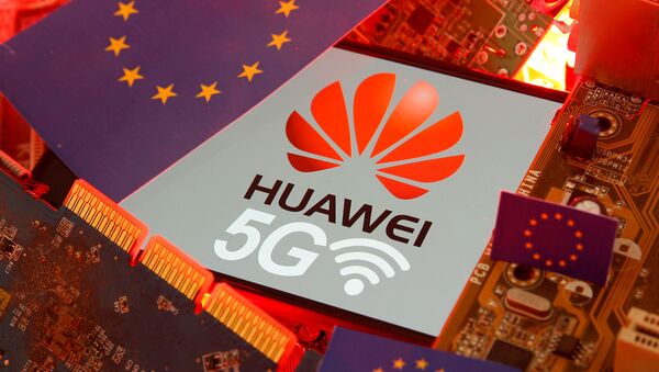 The EU flag and a smartphone with the Huawei and 5G network logo are seen on a PC motherboard in this illustration taken January 29, 2020. - Sputnik International