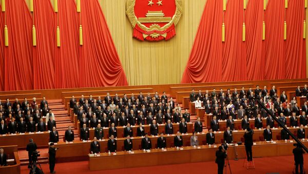File picture of officials singing the national anthem at the closing session last year of the National People's Congress (NPC) at the Great Hall of the People in Beijing, China March 15, 2019. - Sputnik International