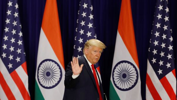 U.S. President Donald Trump waves as he leaves after a news conference in New Delhi, India, February 25, 2020 - Sputnik International
