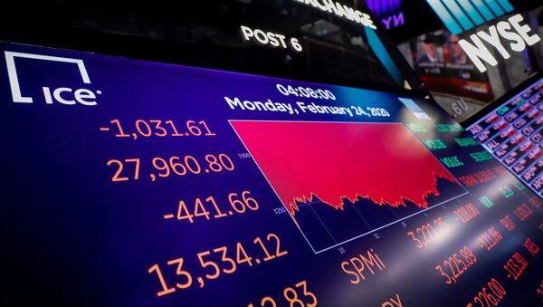 A screen displays the Dow Jones Industrial Average after the closing bell on the floor at the New York Stock Exchange (NYSE) in New York, U.S., February 24, 2020. REUTERS/Brendan McDermid - Sputnik International