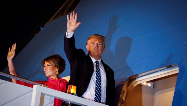 U.S. President Donald Trump and first lady Melania Trump wave as they board Air Force One as they conclude their two day visit to India, at Air Force Station Palam in New Delhi, India, February 25, 2020. Picture taken February 25, 2020.  - Sputnik International