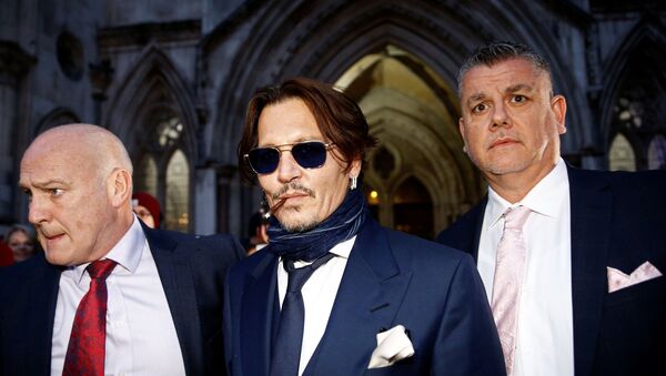 Actor Johnny Depp leaves the High Court in London, Britain - Sputnik International