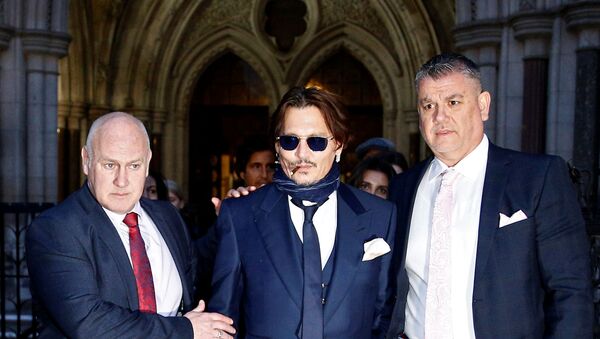 Actor Johnny Depp leaves the High Court in London, Britain, February 26 - Sputnik International