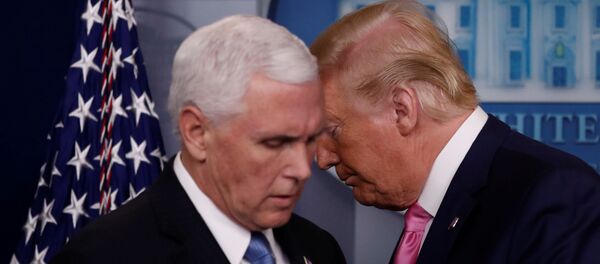 U.S. President Donald Trump walks past Vice President Mike Pence during a news conference at the White House in Washington, U.S., February 26, 2020.  REUTERS/Carlos Barria - Sputnik International