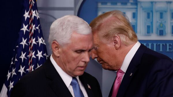 U.S. President Donald Trump walks past Vice President Mike Pence during a news conference at the White House in Washington, U.S., February 26, 2020.  REUTERS/Carlos Barria - Sputnik International