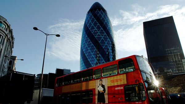 An Arriva bus passes the Swiss Re building in the City of London - Sputnik International