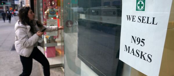 A woman walks into a pharmacy to purchase N95 face masks in advance of the potential coronavirus outbreak in the Manhattan borough of New York City, New York, U.S., 27 February 2020. A woman walks into a pharmacy to purchase N95 face masks in advance of the potential coronavirus outbreak in the Manhattan borough of New York City, New York, U.S., 27 February 2020. - Sputnik International