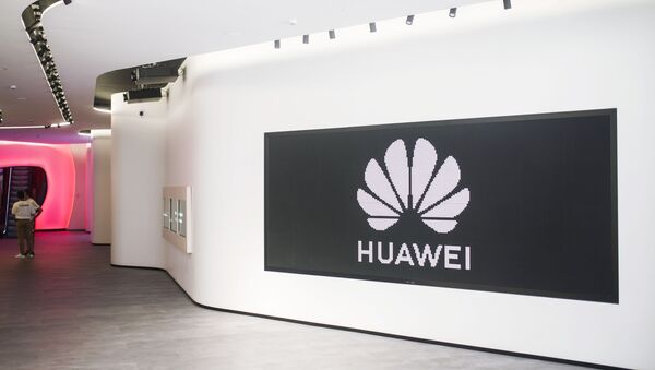 Huawei company logo in a company store in Madrid - Sputnik International