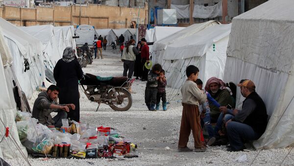 Internally displaced Syrians are seen in an IDP camp located in Idlib, Syria, 27 February 2020. - Sputnik International