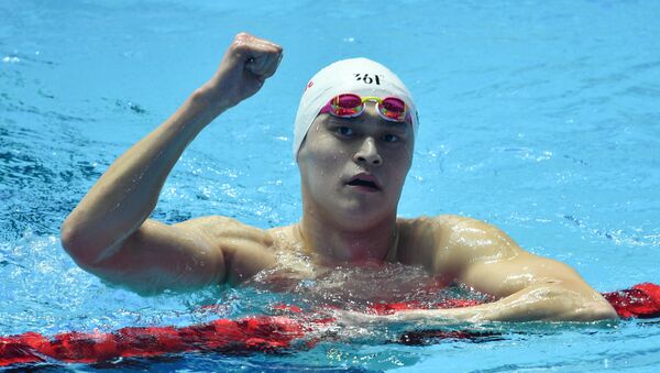 China's Sun Yang reacts during the swimming men's 400m freestyle final competition at the World Aquatics Championships, in Gwangju, South Korea - Sputnik International