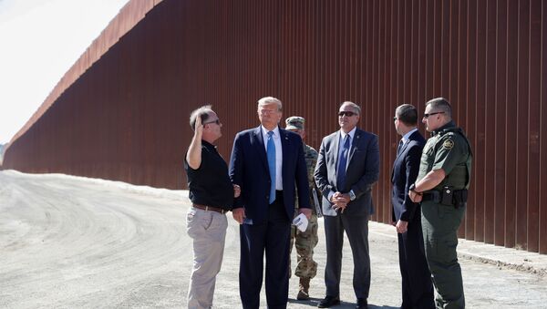 FILE PHOTO: U.S. President Donald Trump visits a section of the U.S.-Mexico border wall in Otay Mesa, California, U.S. September 18, 2019. REUTERS/Tom Brenner/File Photo - Sputnik International