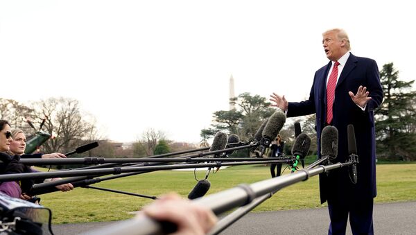U.S. President Donald Trump talks to reporters as he departs on campaign travel to Charleston, South Carolina from the South Lawn of the White House in Washington, U.S.,  February 28, 2020. REUTERS/Kevin Lamarque - Sputnik International