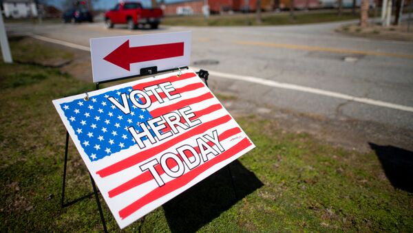 A placard stating VOTE HERE TODAY is seen outside the Cowpens Depot Center polling location on the day of the South Carolina Presidential Primary in Cowpens, South Carolina, 29 February 2020. REUTERS/Mark Makela - Sputnik International