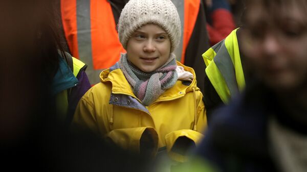 Climate activist Greta Thunberg, from Sweden marches with other demonstrators as she participates in a school strike climate protest in Bristol, south west England, Friday, Feb. 28, 2020. - Sputnik International