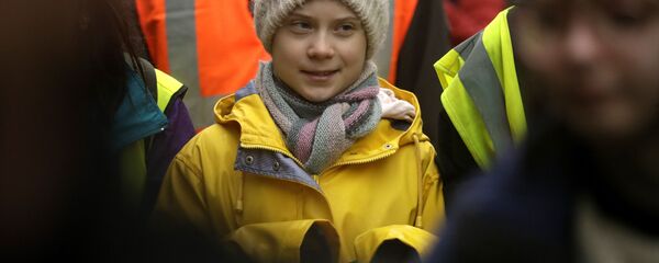 Climate activist Greta Thunberg, from Sweden marches with other demonstrators as she participates in a school strike climate protest in Bristol, south west England, Friday, Feb. 28, 2020. - Sputnik International
