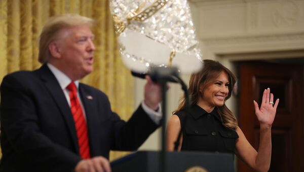 WASHINGTON, DC - FEBRUARY 27: U.S. President Donald Trump (L) and first lady Melania Trump take the stage during a Black History Month reception in the East Room of the White House February 27, 2020 in Washington, DC.  - Sputnik International