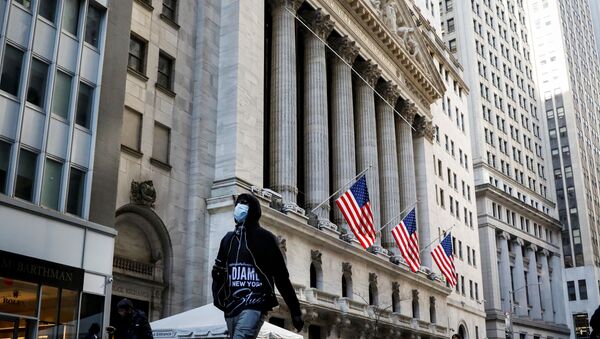 A man wears a mask as he walks near the New York Stock Exchange (NYSE) in the financial district in New York City, U.S., March 2, 2020. - Sputnik International