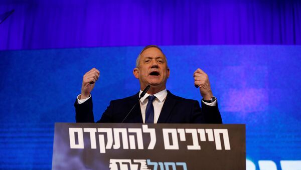 Blue and White party leader Benny Gantz gestures as he speaks to supporters following the announcement of exit polls in Israel's election at the party's headquarters in Tel Aviv, Israel March 3, 2020 - Sputnik International