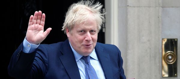 Britain's Prime Minister Boris Johnson waves as he leaves Downing Street in London, Britain, February 26, 2020 - Sputnik International