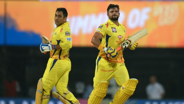 Chennai Super Kings cricketer captain Mahendra Singh Dhoni (L) and Suresh Raina (R) run between the wickets during the 2019 Indian Premier League (IPL) Twenty20 cricket match between Chennai Super Kings and Rajasthan Royals at the M.A. Chidambaram Stadium in Chennai on March 31, 2019 - Sputnik International