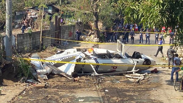 The site of a helicopter crash in San Pedro, Laguna province, south of Manila, Philippines - Sputnik International