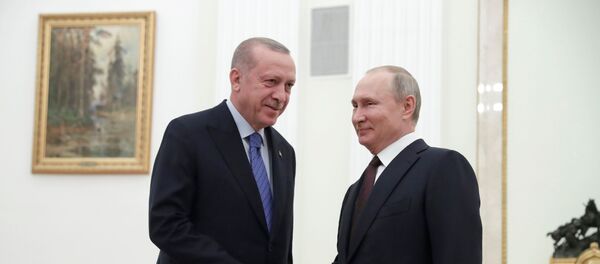 Russian President Vladimir Putin shakes hands with Turkish President Tayyip Erdogan during a meeting in Moscow, Russia March 5, 2020 - Sputnik International
