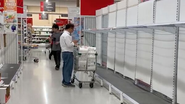 Empty shelves are pictured in a supermarket that is running out of toilet paper and pasta amid coronavirus fears in Sydney, Australia March 3, 2020 in this still image obtained from a social media video - Sputnik International