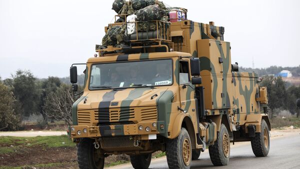 A Turkish military convoy in the east of Idlib, Syria - Sputnik International