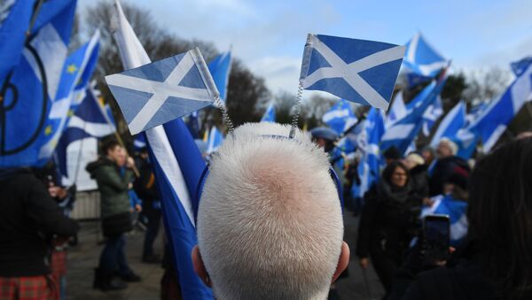 Activists attend an anti-Conservative government, pro-Scottish independence, and anti-Brexit demonstration outside Holyrood, the seat of the Scottish Parliament in Edinburgh on 1 February 2020. - Britain began its post-Brexit uncertain future outside the European Union on Saturday after the country greeted the historic end to almost half a century of EU membership with a mixture of joy and sadness. There were celebrations and tears on Friday as the EU's often reluctant member became the first to leave an organisation set up to forge unity among nations after the horrors of World War II. - Sputnik International