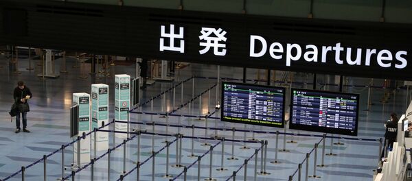 An empty departures gate is pictured at Haneda Airport in Tokyo, Japan, 4 March 2020. - Sputnik International