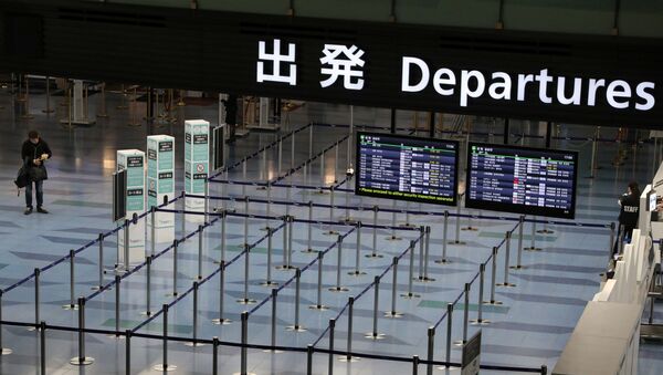 An empty departures gate is pictured at Haneda Airport in Tokyo, Japan, 4 March 2020. - Sputnik International