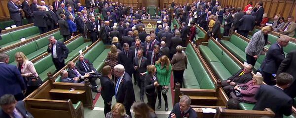 FILE PHOTO: MPs leave the House of Commons to vote in the election of the new Speaker of the House, in London, Britain November 4, 2019, in this screen grab taken from video. Parliament TV via REUTERS./File Photo FILE PHOTO: MPs leave the House of Commons to vote in the election of the new Speaker of the House, in London, Britain November 4, 2019, in this screen grab taken from video. Parliament TV via REUTERS./File Photo - Sputnik International